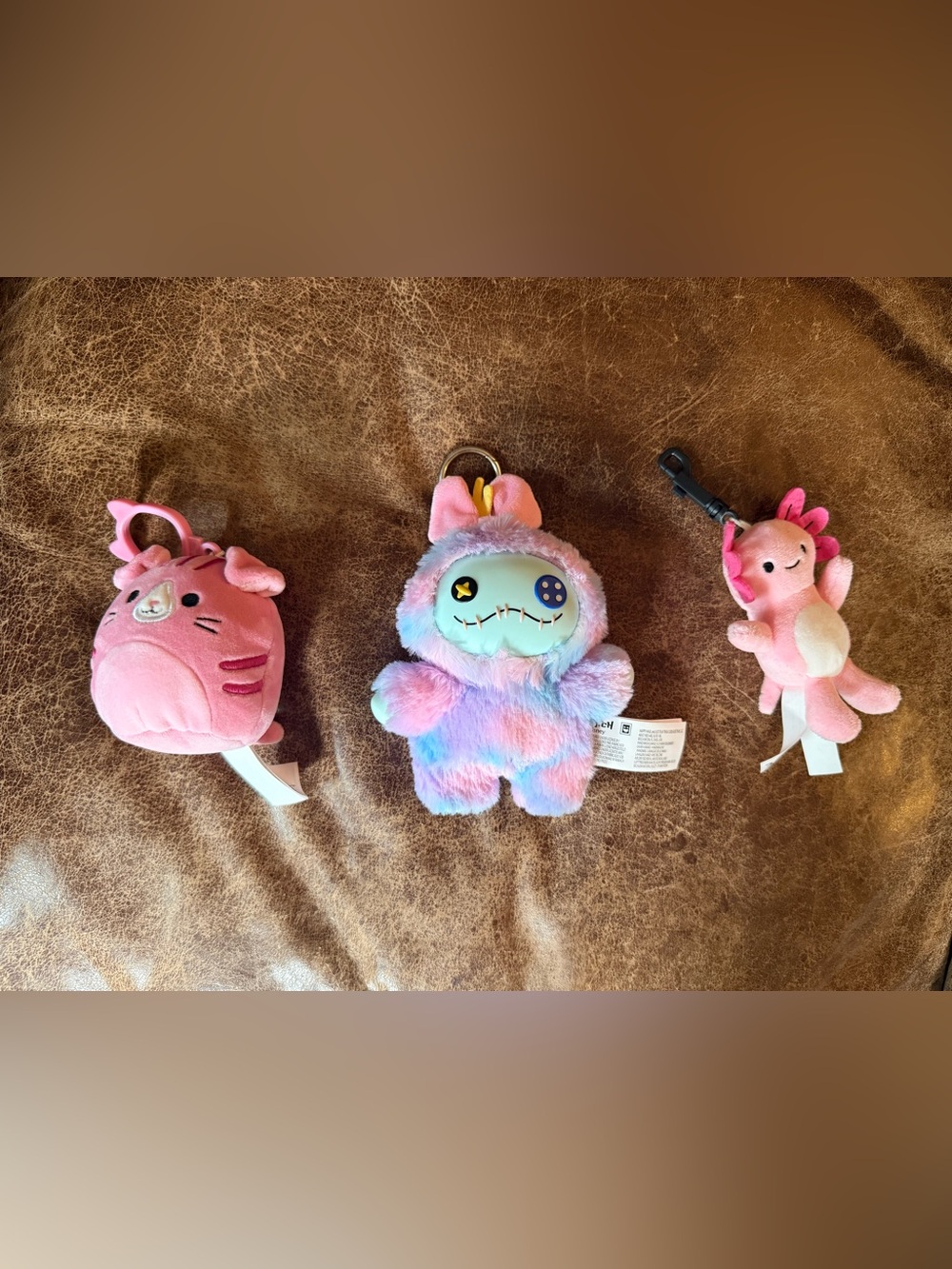 Bundle of key chains Squishmallow, Lilo and Stitch, and pink  axolotl